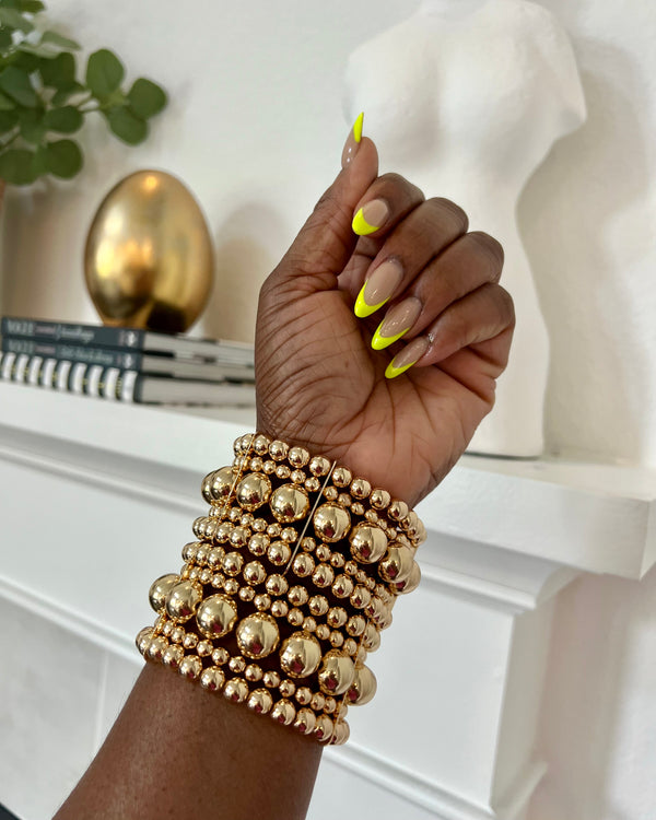 ELASTIC BRACELET WITH BALL DETAILS